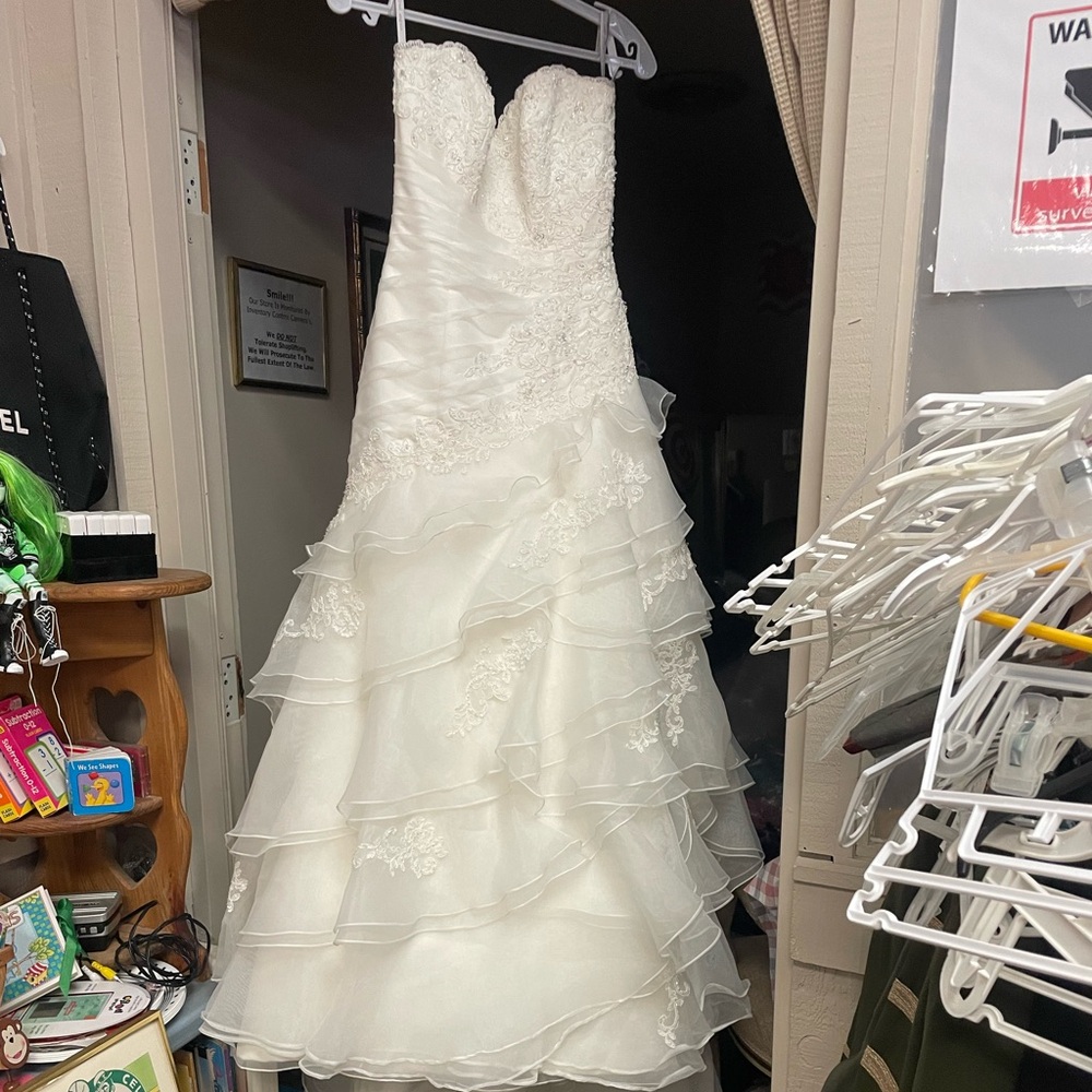 Alfred Angelo strapless, layered, high low wedding gown